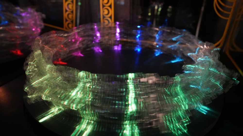 A colourful exhibit shows many cut out dancers spinning to create the illusion of movement at Camera Obscura
