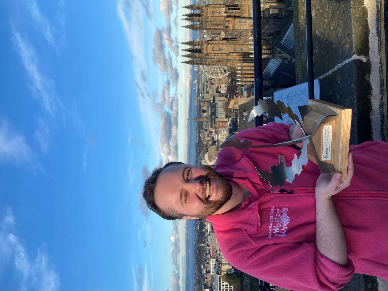 Guide, Isaac, with the Thistle Award on the Rooftop Terrace at Camera Obscura