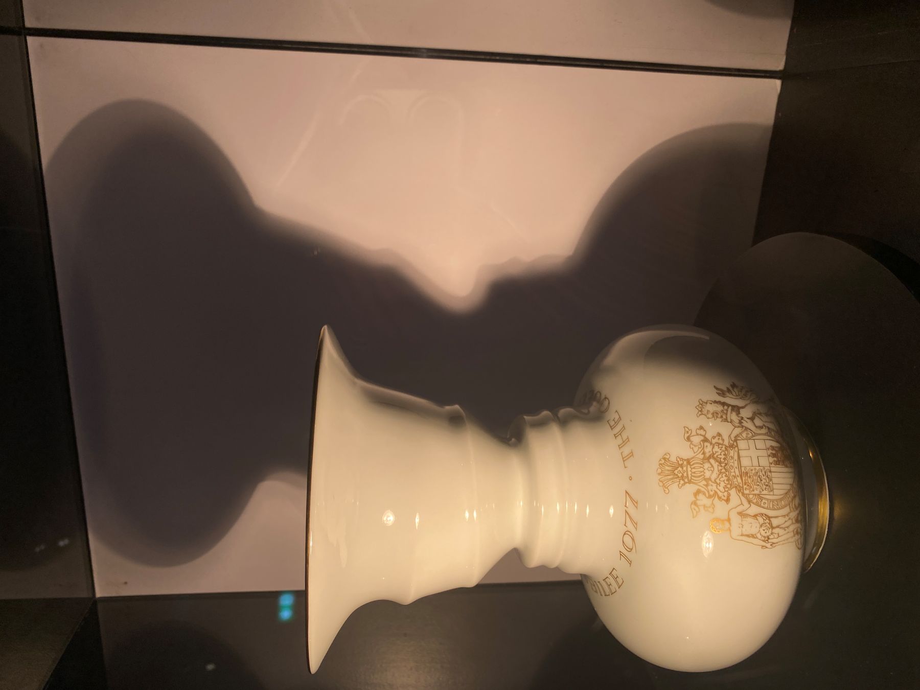 A Ruben's Vase, which when lit, casts a shadow of the profile of the Queens face