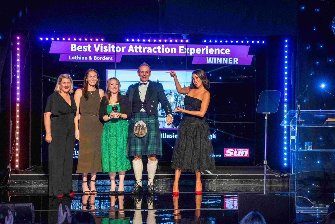 Team members from Camera Obscura accept the regional Thistle Award for best visitor attraction 2022
