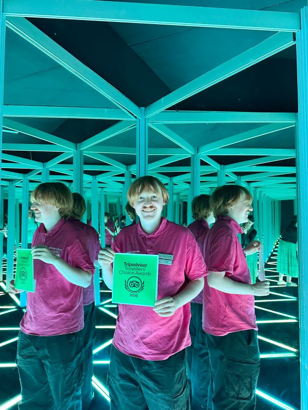 Guide Mathew in the MIrror Maze with the Tripadvisor Travellers Choice Award 2025 at Camera Obscura