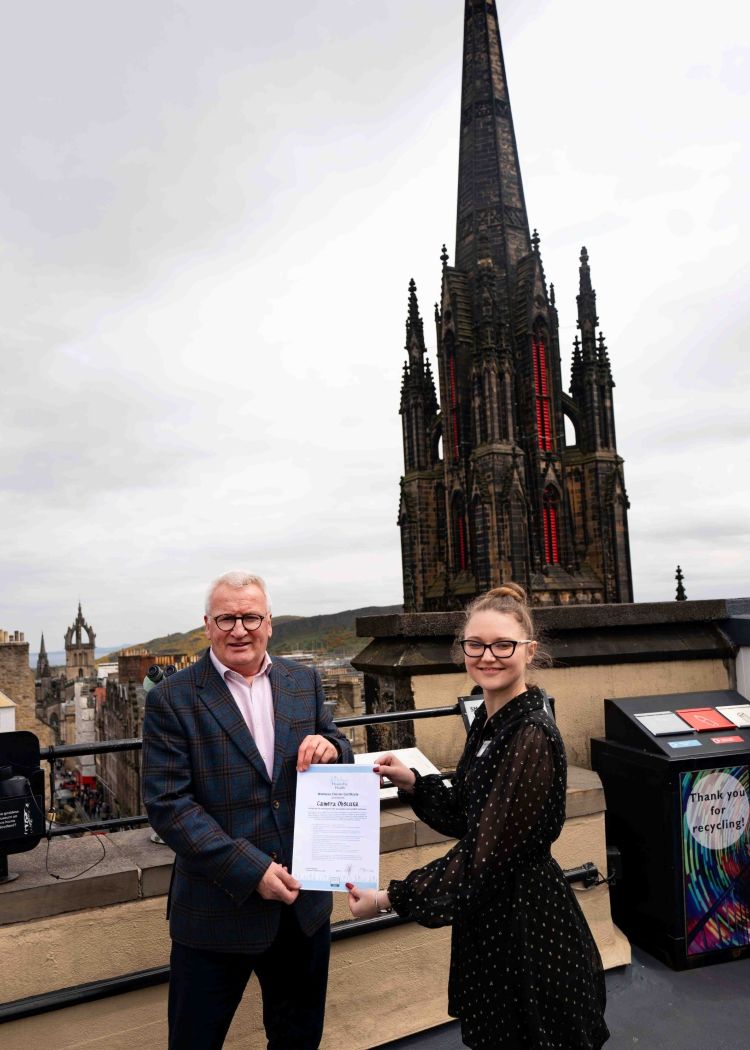 The team at Camera Obscura receive the award from Hospitality Health 