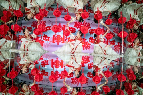 Runkun Sun sits inside the Chinese New Year themed Giant Kaleidoscope at Camera Obscura & World of Illusions. Credit Jane Barlow Photography