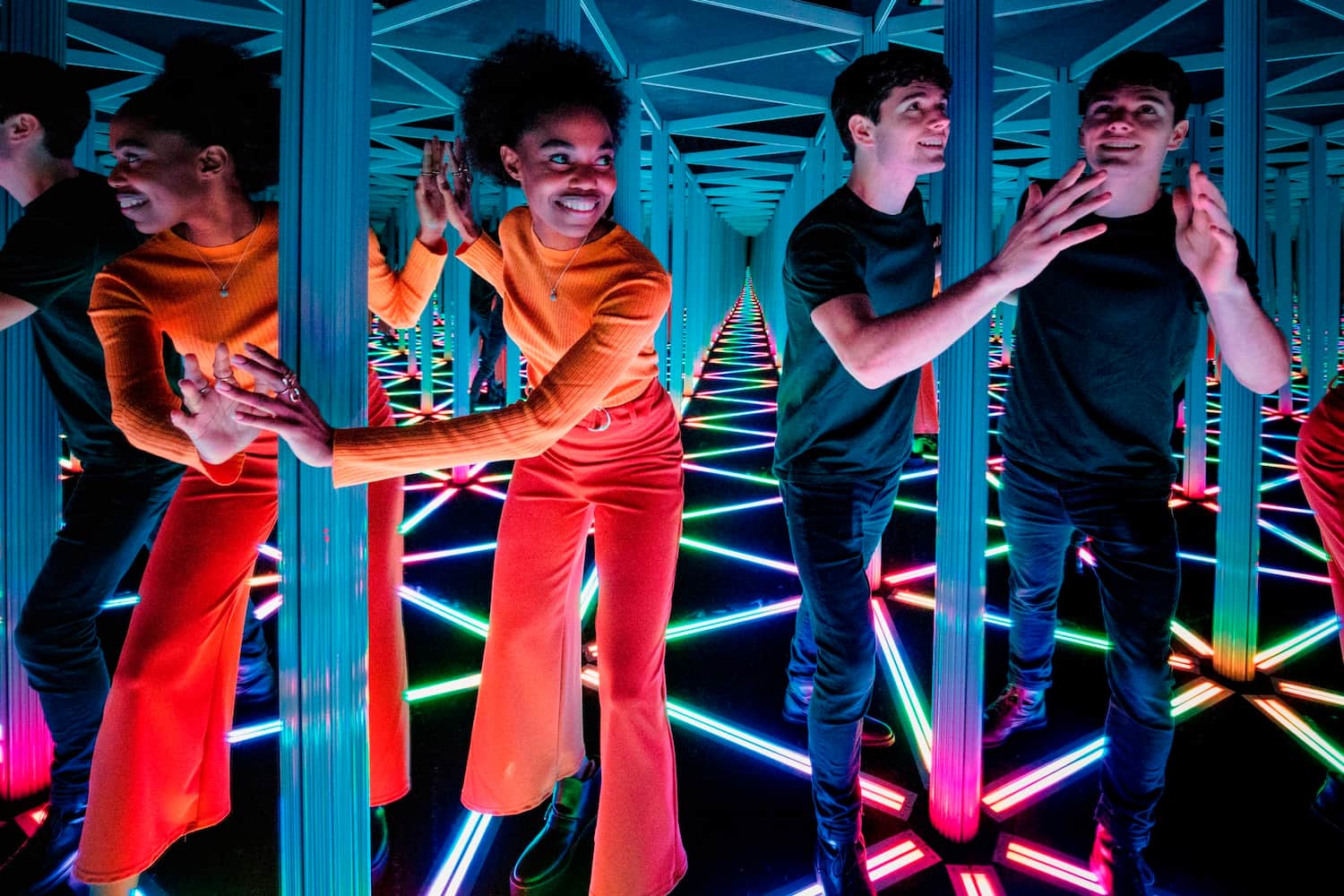 A man and a woman in the mirror maze at Camera Obscura 