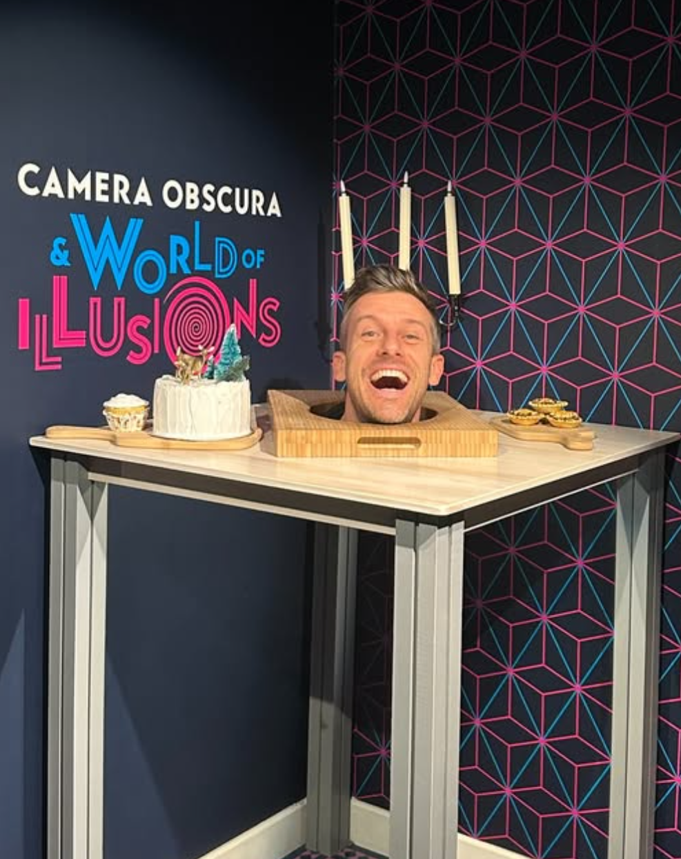 Comedian Chris Ramsey using the Severed Head exhibit at Camera Obscura & World of Illusions, Edinburgh