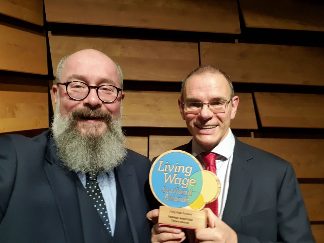 Tony and Andrew receive the Living Wage Trailblazer award for Camera Obscura 